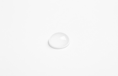 Photo of Pure water drop on white background, closeup