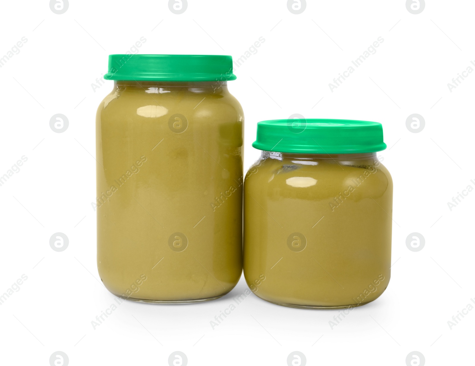 Photo of Glass jars with healthy baby food isolated on white