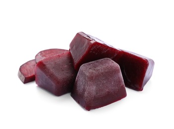 Photo of Frozen beetroot puree cubes and fresh beetroot isolated on white