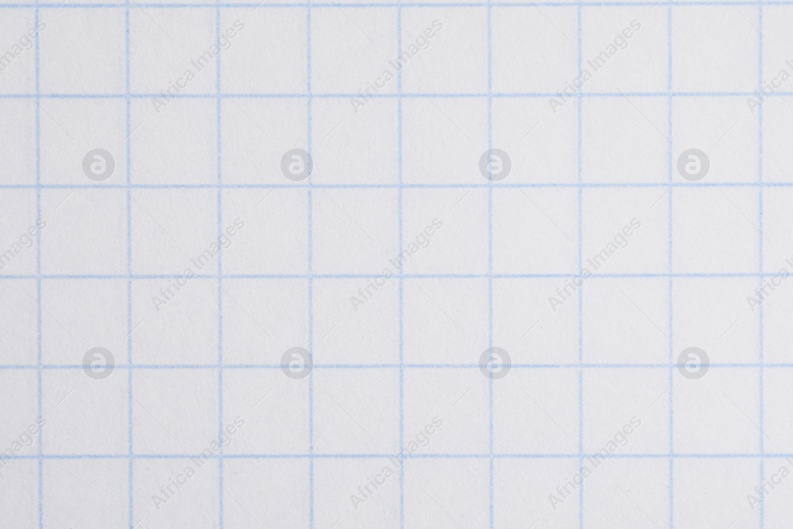 Photo of Texture of copybook paper sheet as background, closeup