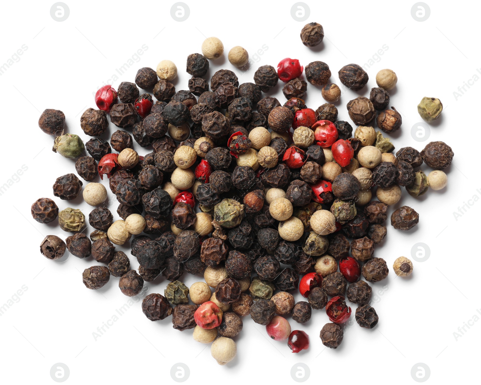 Photo of Aromatic spices. Pile of different peppers isolated on white, top view