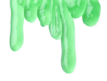 Photo of Flowing green slime on white background. Antistress toy