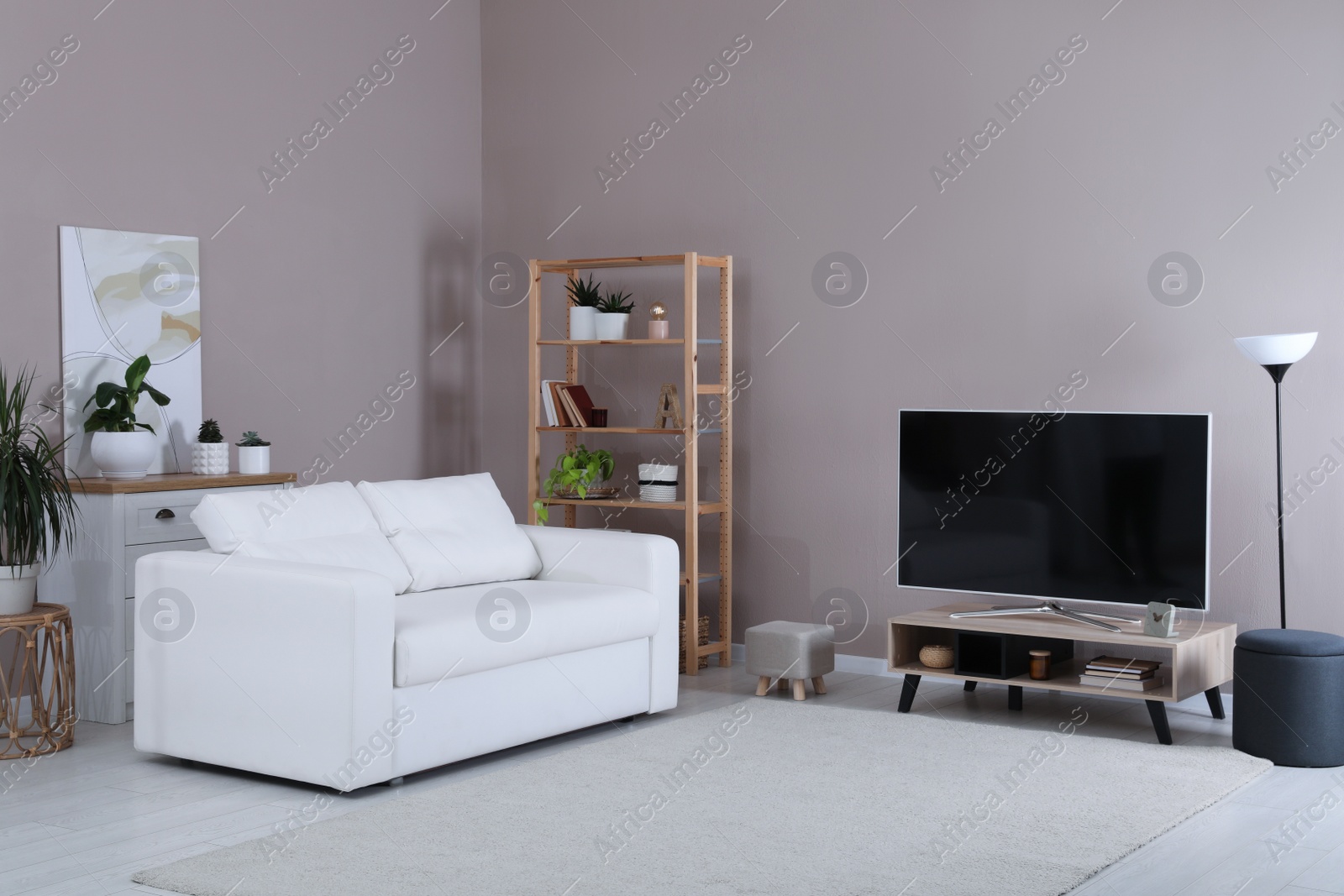 Photo of Living room interior with modern TV on stand