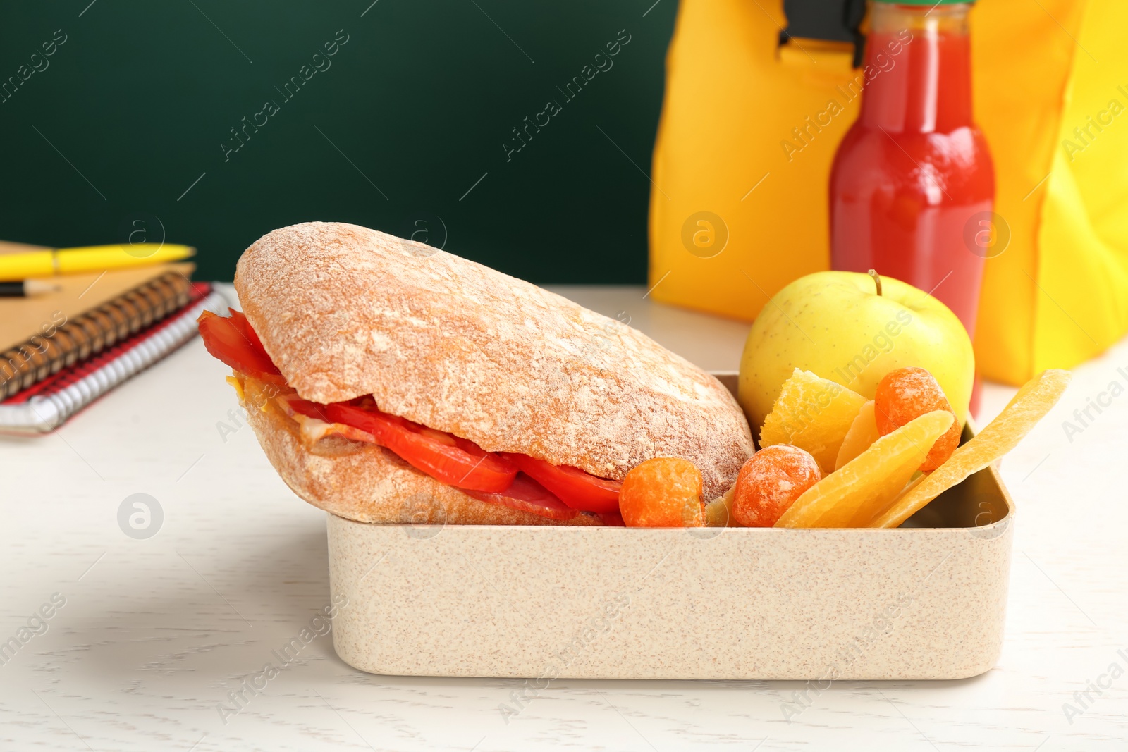 Photo of Lunch box with appetizing food on table