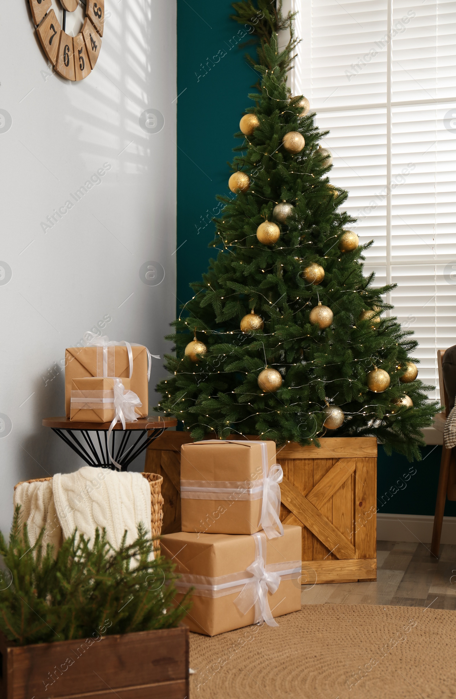 Photo of Beautiful decorated Christmas tree in living room interior