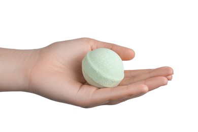 Photo of Woman holding bath bomb on white background, closeup