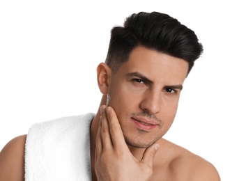 Handsome man with stubble before shaving on white background