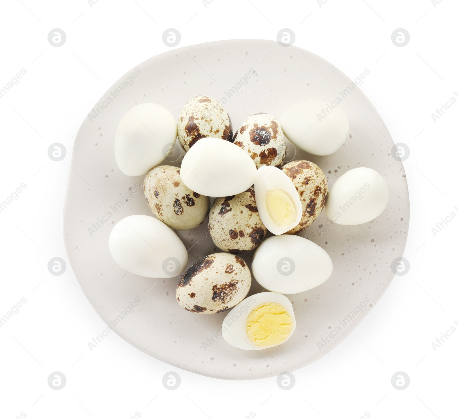 Photo of Unpeeled and peeled hard boiled quail eggs in plate on white background, top view