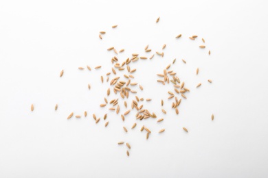 Raw rye on white background. Healthy grains and cereals