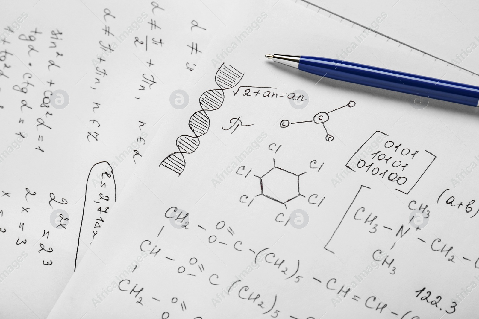 Photo of Sheets of paper with different chemical formulas and pen, closeup