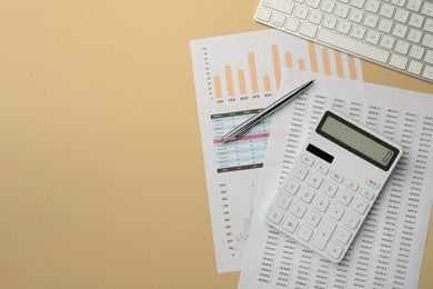 Accounting documents, calculator, computer keyboard and pen on beige background, flat lay. Space for text