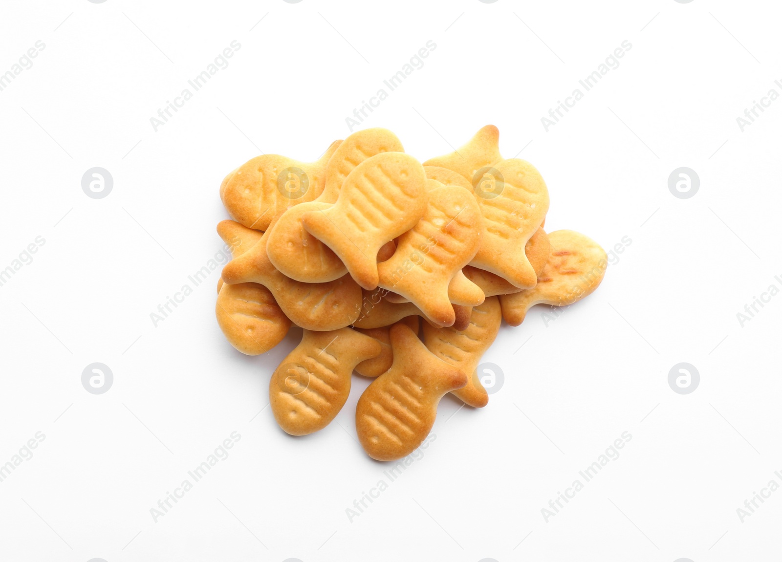 Photo of Delicious crispy goldfish crackers on white background, top view