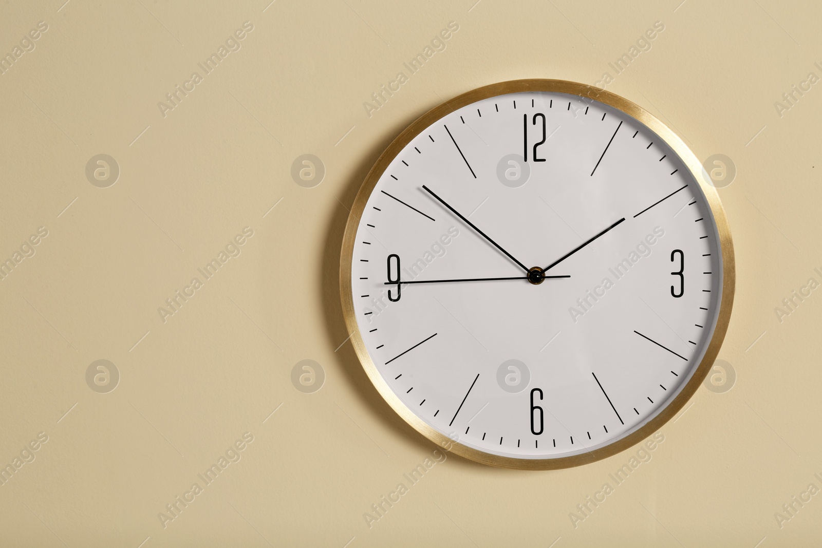 Photo of Stylish clock and space for text on color background. Time management