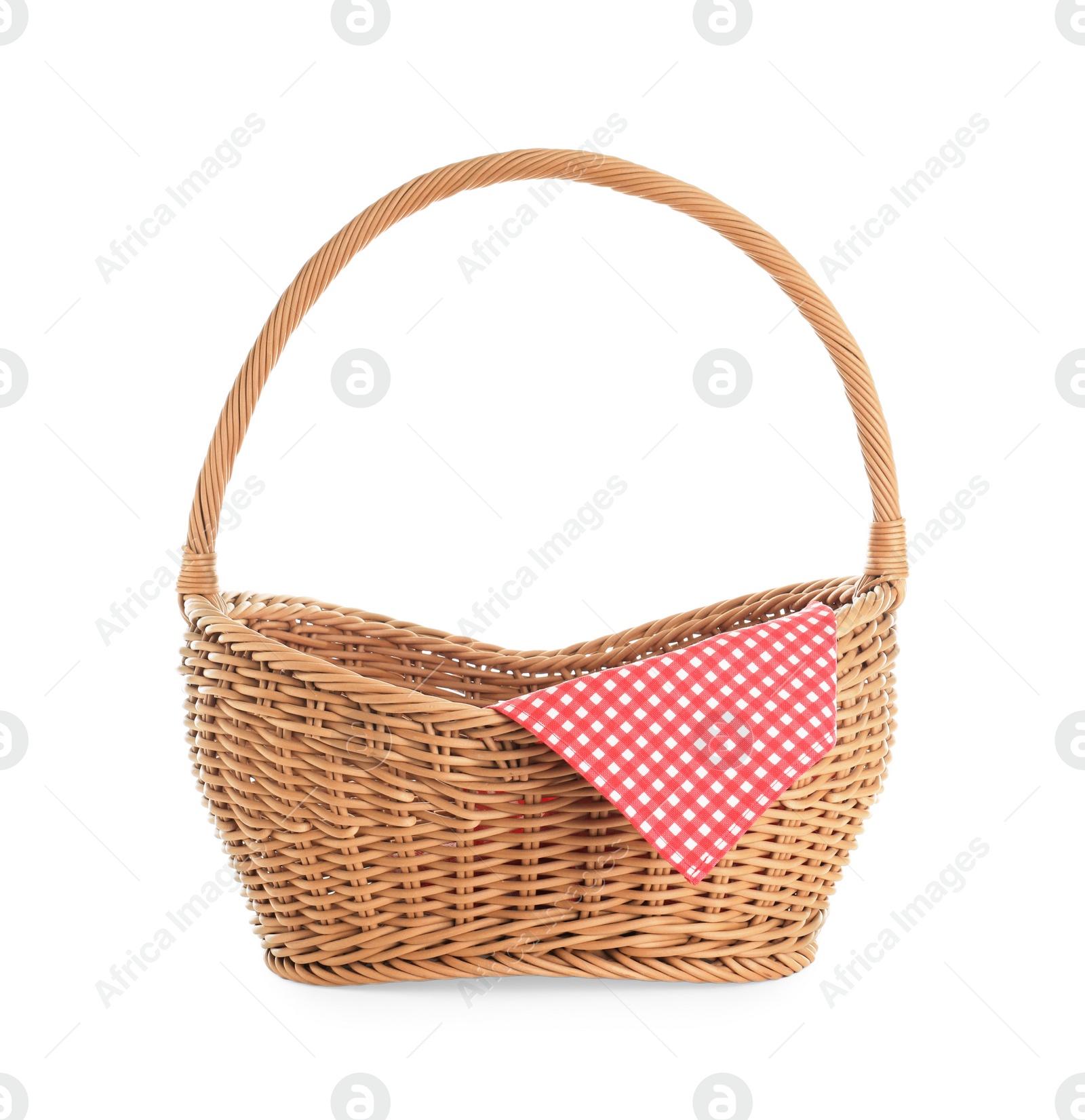 Photo of Wicker picnic basket with checkered tablecloth on white background
