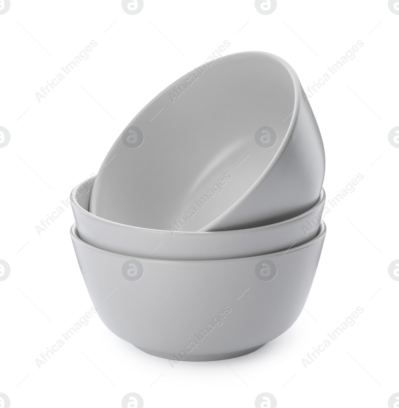 Photo of Clean empty ceramic bowls on white background