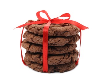 Photo of Tasty homemade chocolate chip cookies tied with red ribbon isolated on white