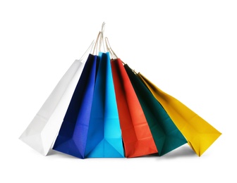 Empty paper shopping bags on white background