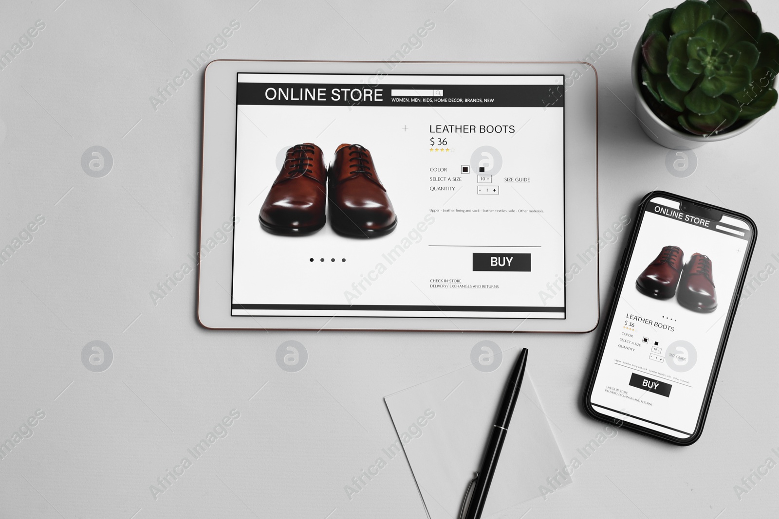 Photo of Online shopping. Flat lay composition with modern tablet and smartphone on white background