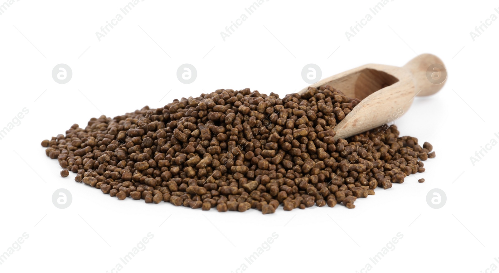 Photo of Buckwheat tea granules and wooden scoop on white background