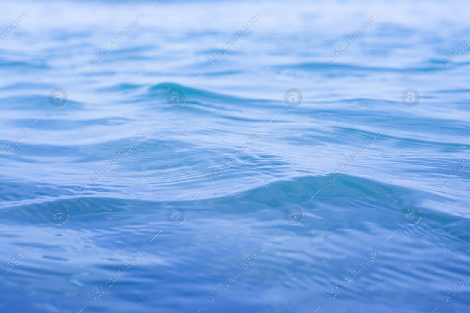 Photo of Beautiful sea water surface with ripples as background