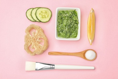 Photo of Flat lay composition with handmade face mask and ingredients on pink background