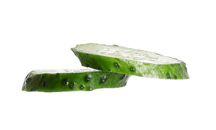 Photo of Juicy cucumber slices isolated on white. Sandwich ingredient