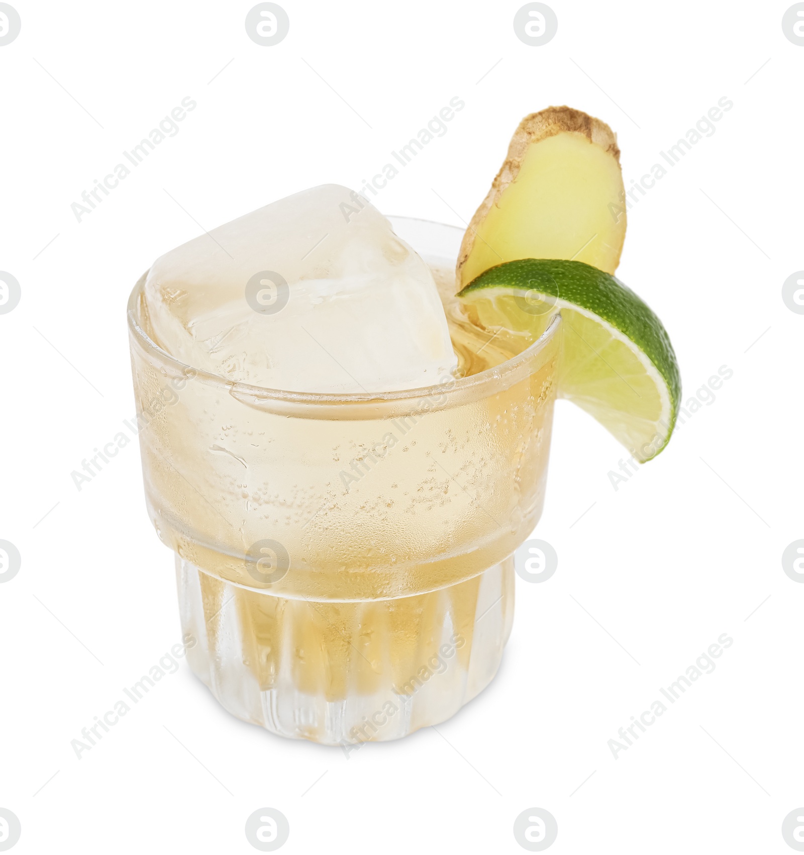 Photo of Glass of tasty ale with ice cube, lime and ginger slices isolated on white