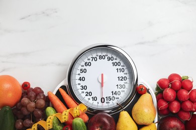 Photo of Flat lay composition with scales and healthy food on white marble table