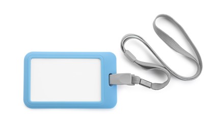 Photo of Blank light blue badge with string isolated on white, top view