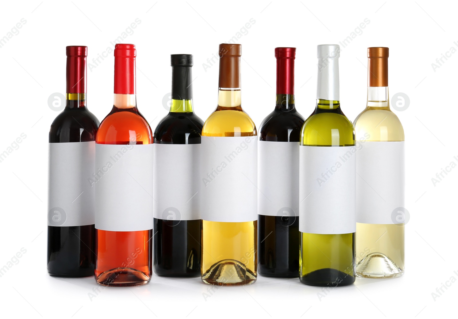 Photo of Bottles with different wine on white background