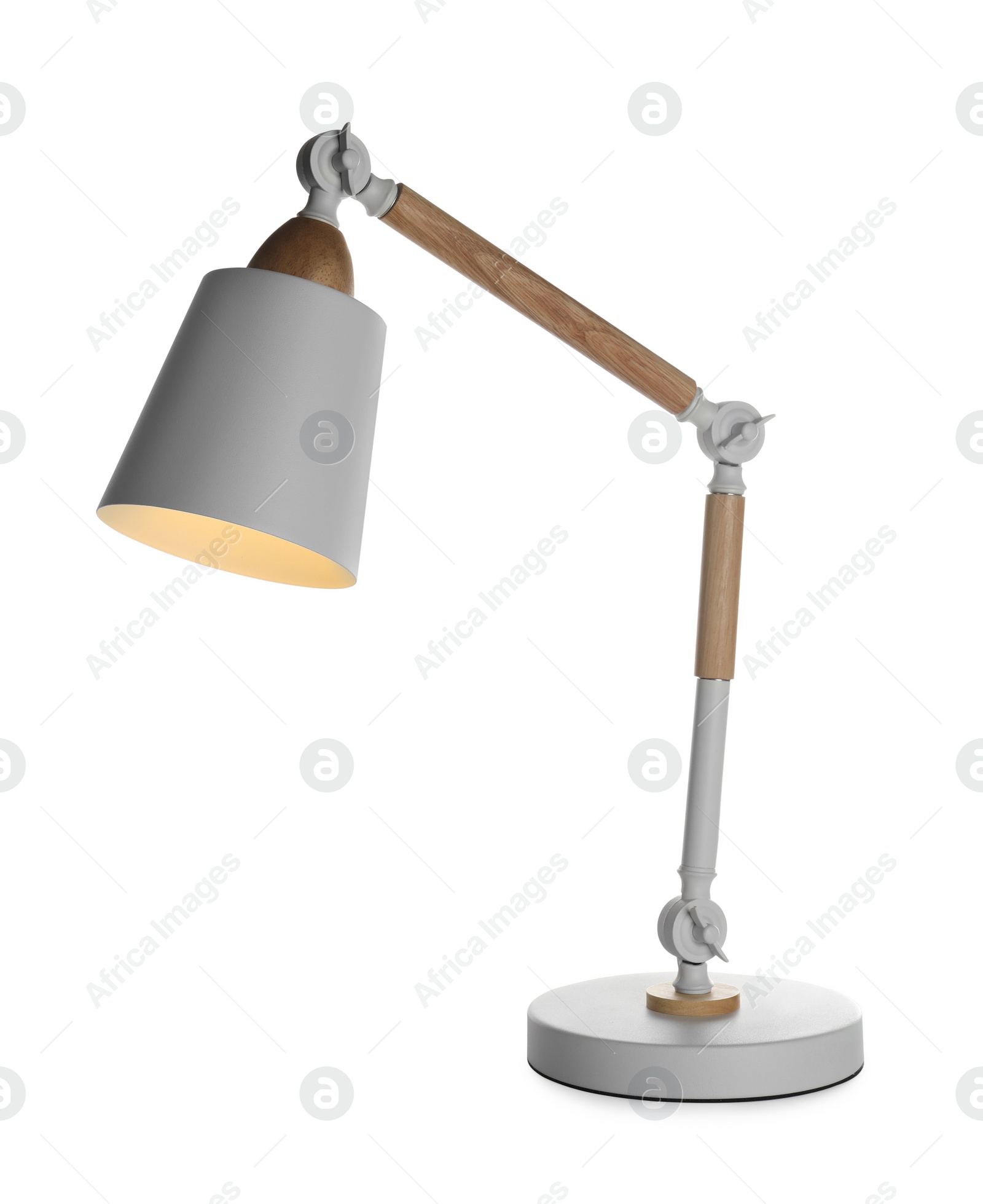 Photo of Stylish modern desk lamp isolated on white