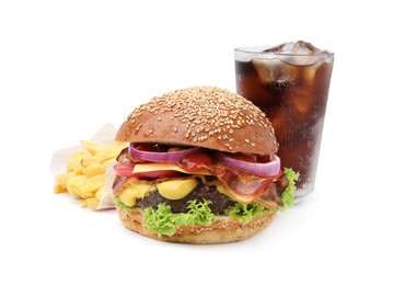 Photo of Delicious burger with bacon, soda drink and french fries isolated on white