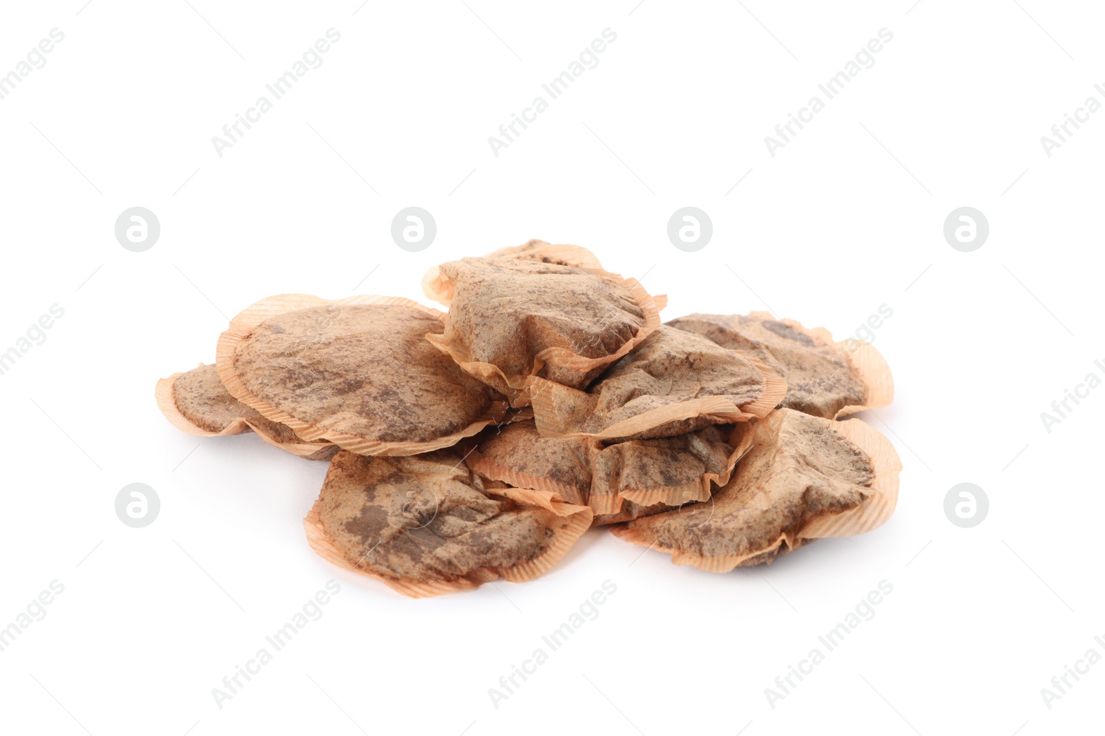 Photo of Many used tea bags on white background