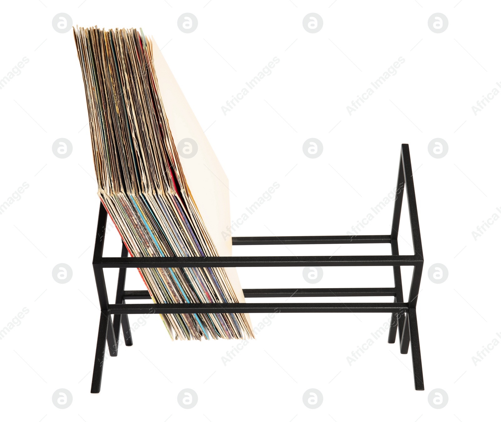 Photo of Rack with vinyl records in sleeves on white background