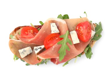 Photo of Tasty bruschetta with prosciutto, arugula, cheese and tomato on white background, top view