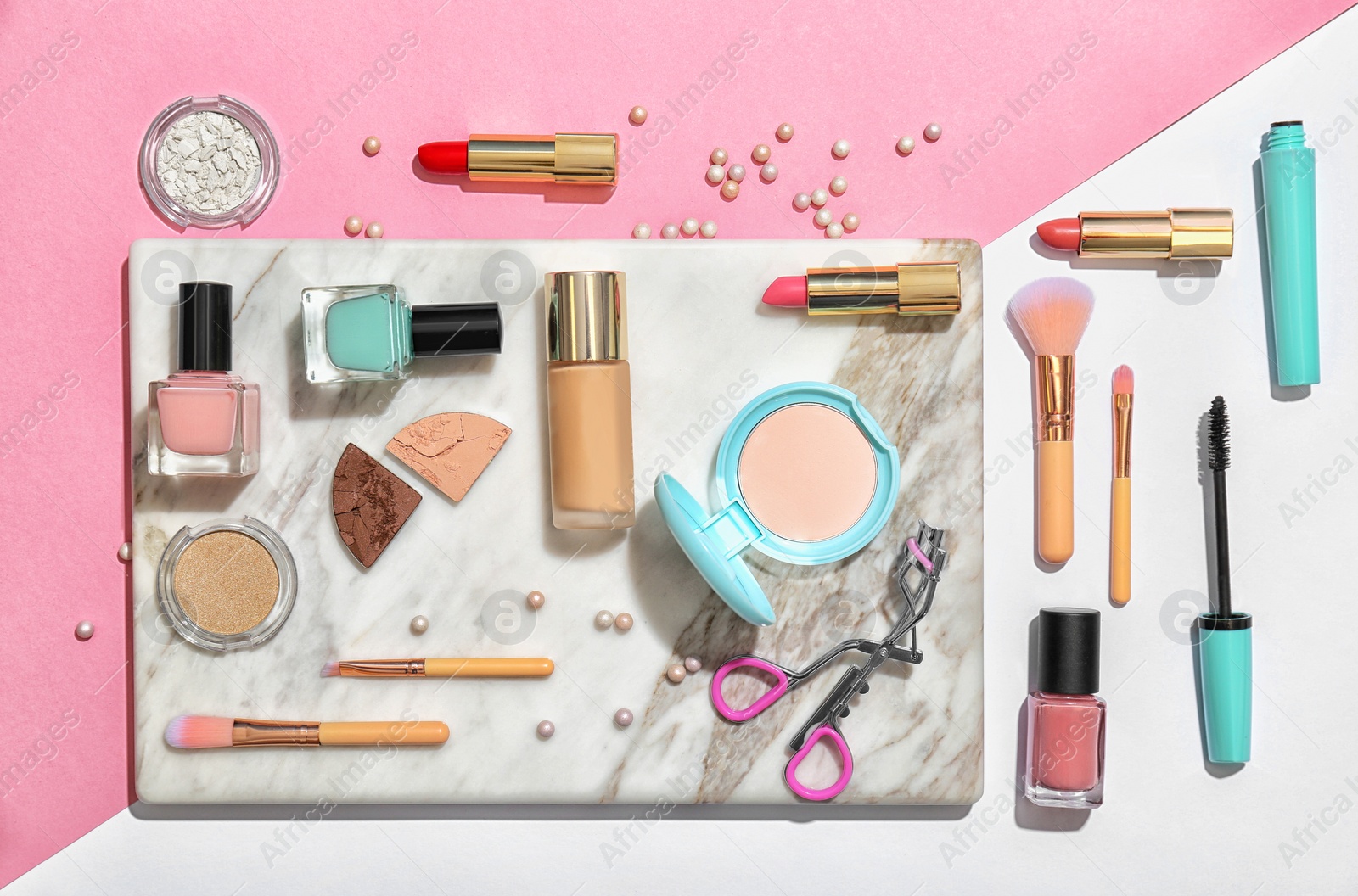 Photo of Flat lay composition with cosmetic products on color background