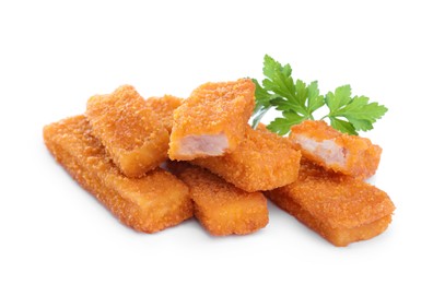 Photo of Fresh breaded fish fingers with parsley on white background
