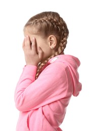 Photo of Girl covering face with hands on white background. Children's bullying