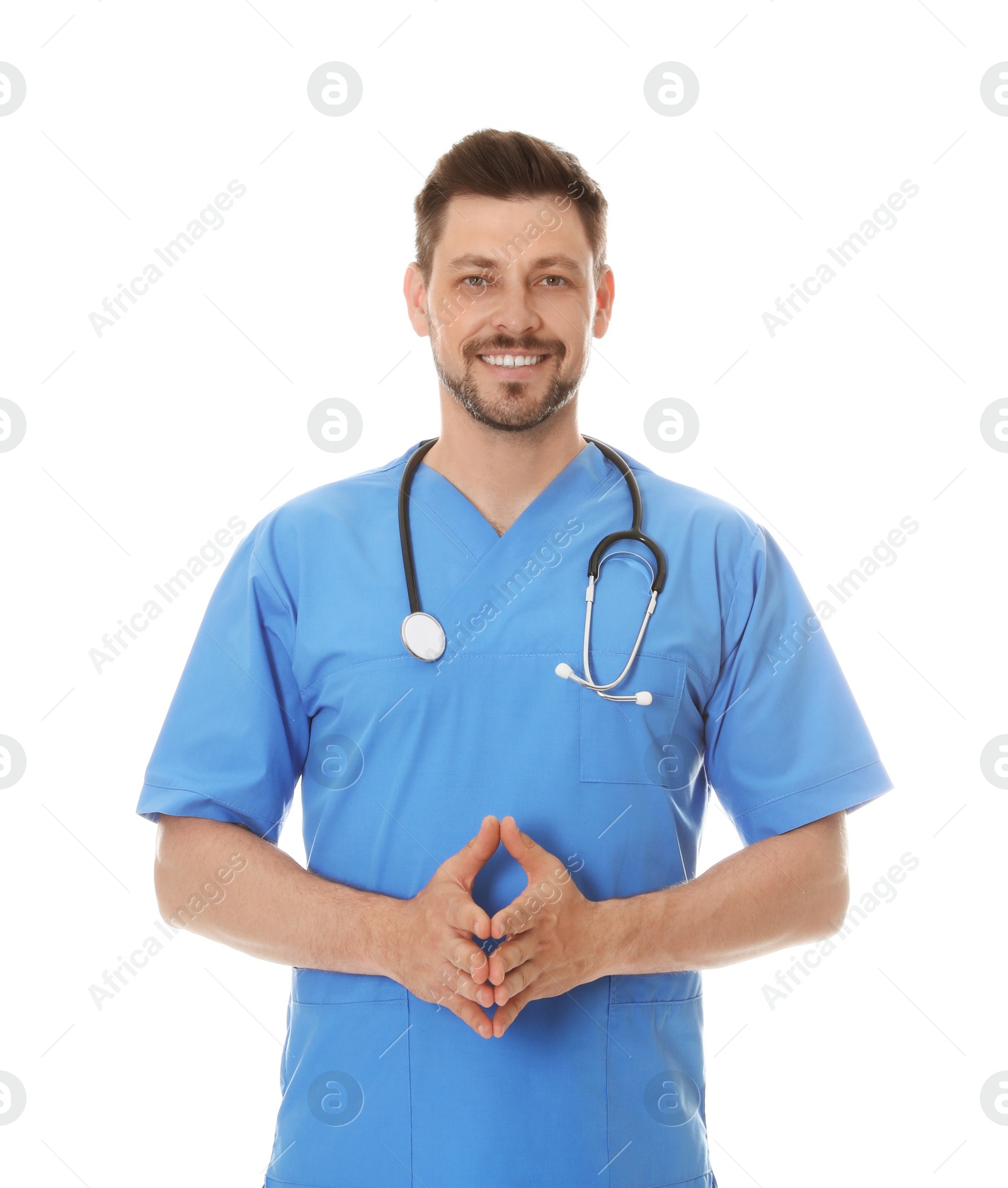 Photo of Portrait of male doctor in scrubs isolated on white. Medical staff