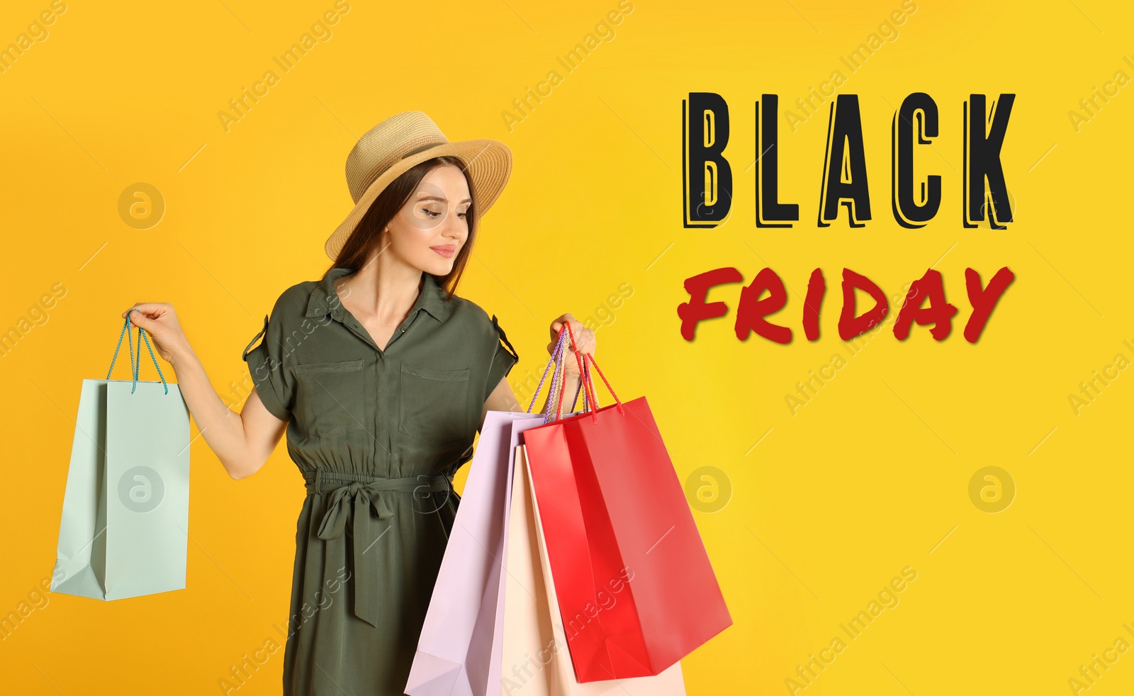 Image of Black Friday Sale. Beautiful young woman with shopping bags on yellow background