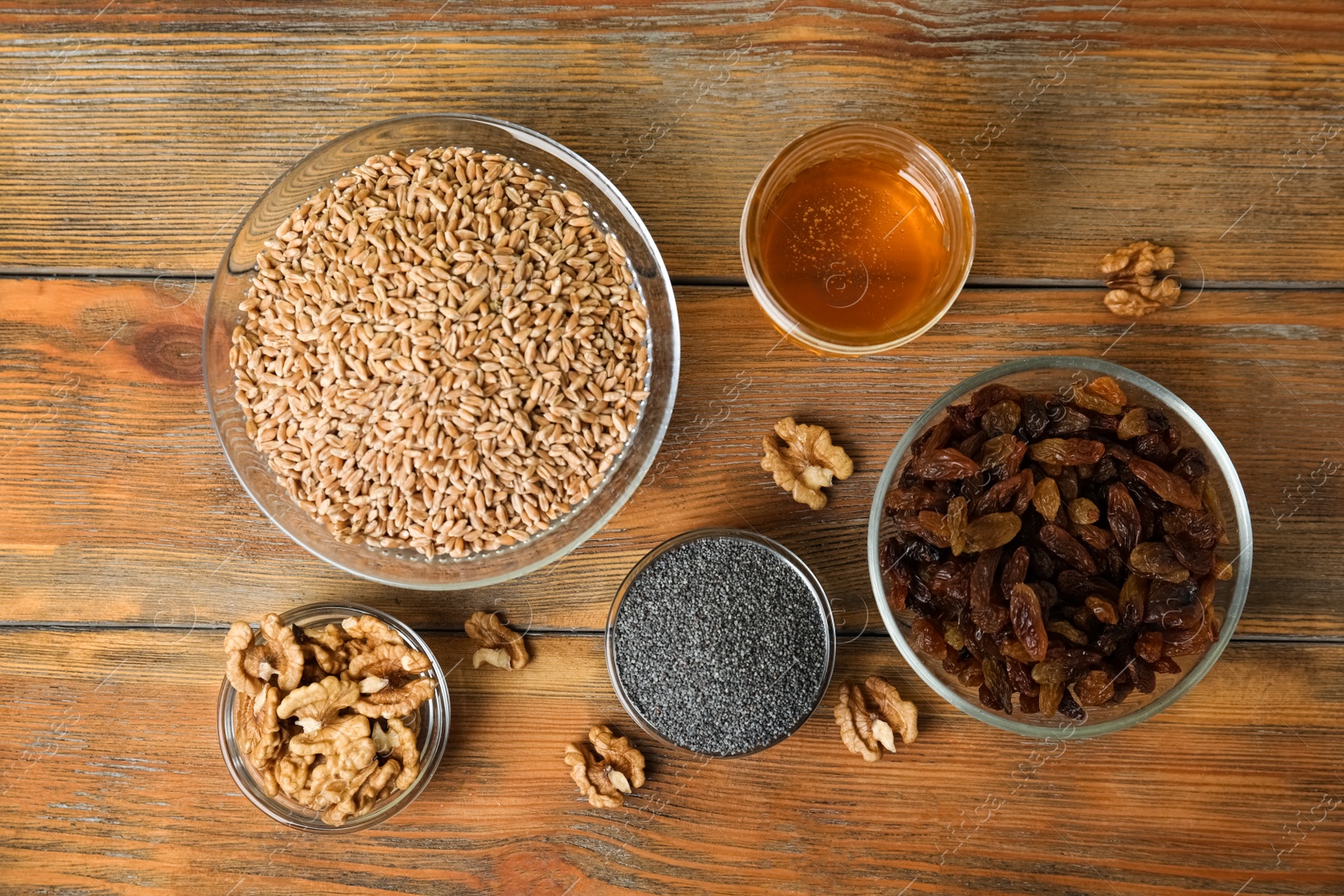 Photo of Ingredients for traditional kutia on wooden table, flat lay