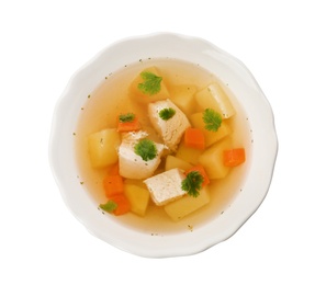 Dish with fresh homemade chicken soup on white background, top view