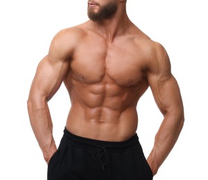 Photo of Young bodybuilder with muscular body on white background, closeup