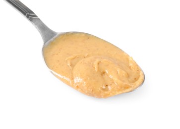 Photo of Delicious nut butter in spoon isolated on white