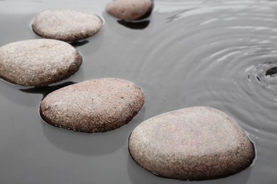 Beautiful spa stones in water. Zen lifestyle