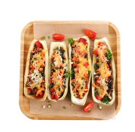 Wooden tray with delicious stuffed zucchini on white background, top view