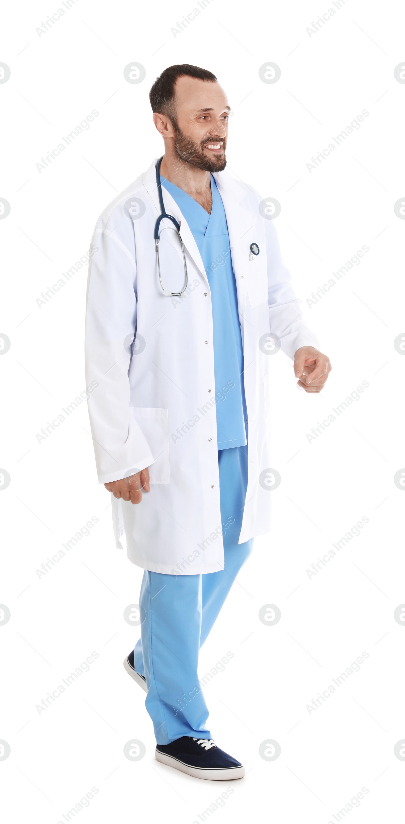 Photo of Full length portrait of male doctor isolated on white. Medical staff