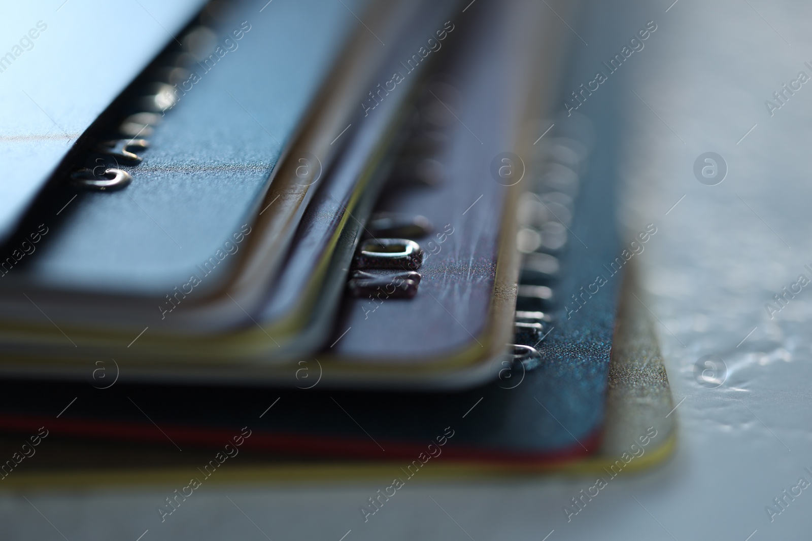 Photo of Plastic credit cards on table, macro view