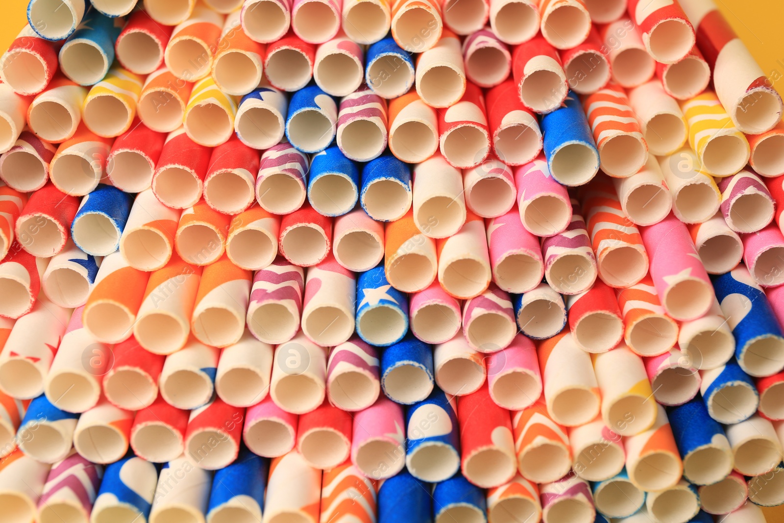 Photo of Many paper drinking straws as background, closeup