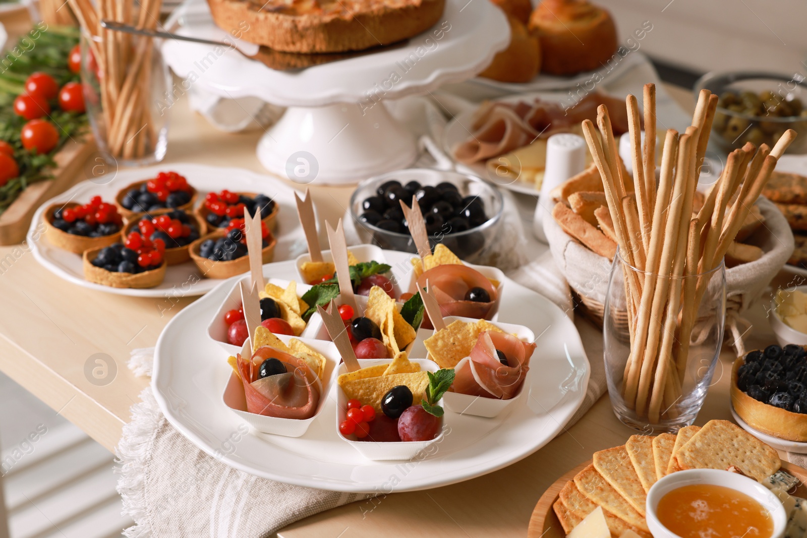 Photo of Dishes with different food on table. Luxury brunch